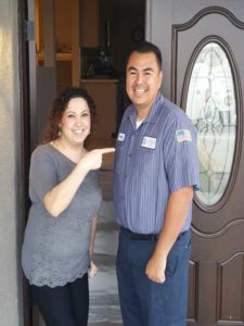 Angel Muro with a happy customer